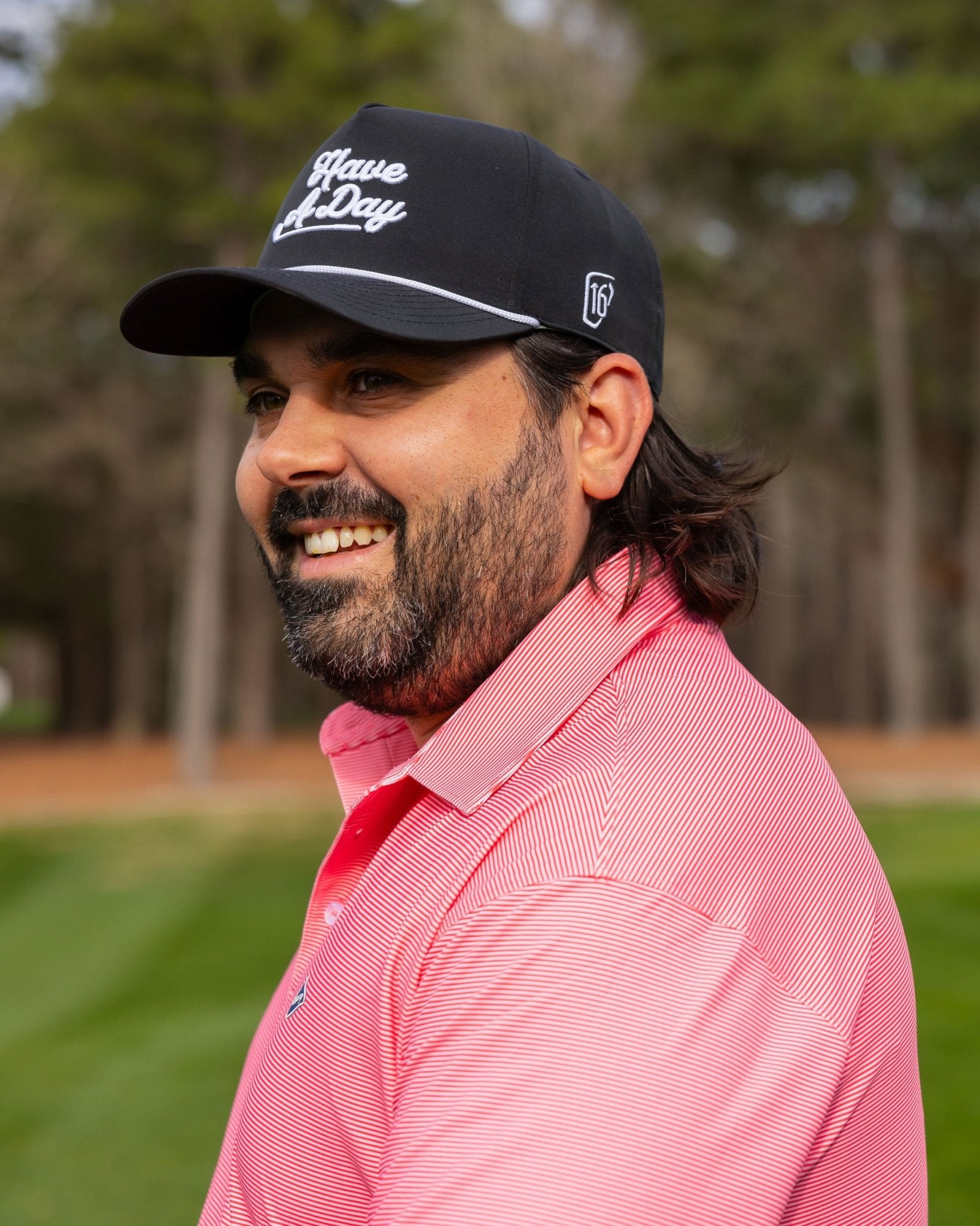 The Red & Pink Stripe Polo | Breezy Golf | Performance Golf Apparel