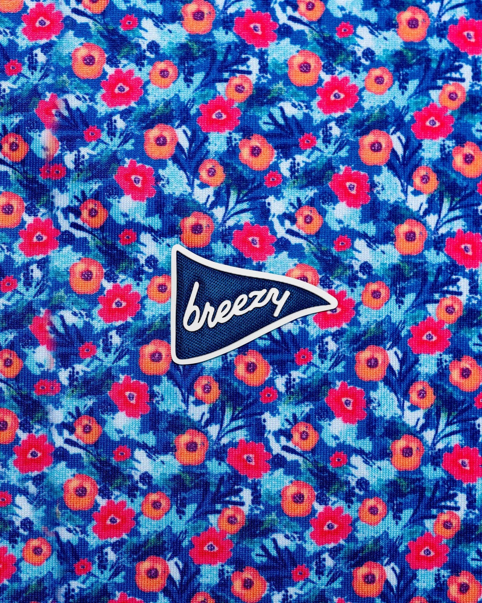 The Breezy Hawaiian Floral Polo | Breezy Golf | Performance Golf Apparel