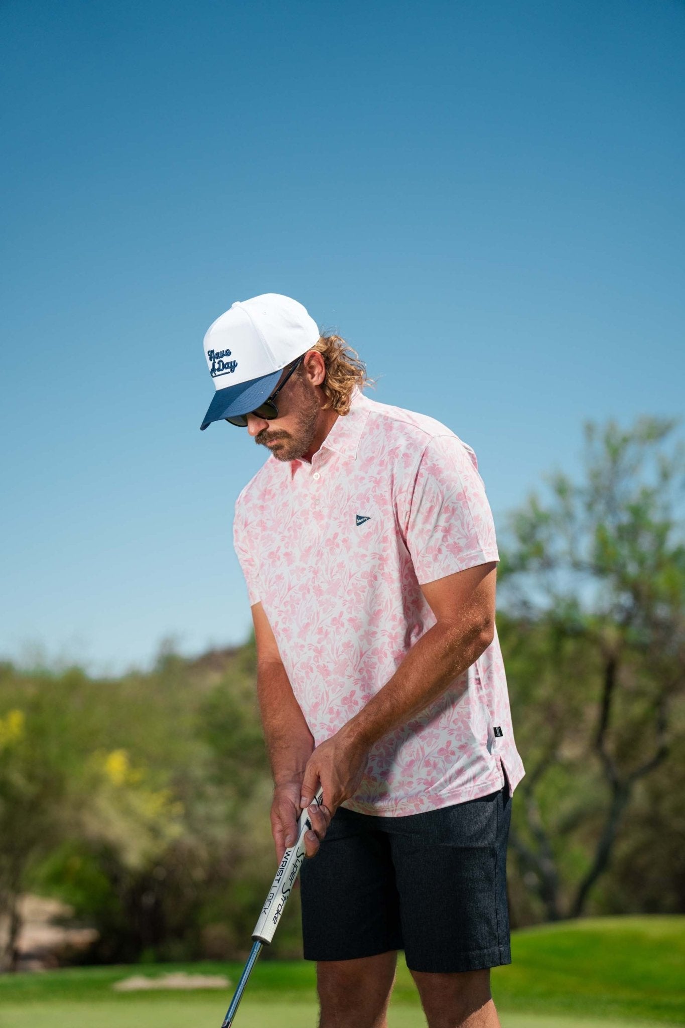 The Watercolor Flowers Polo | Breezy Golf | Performance Golf Apparel