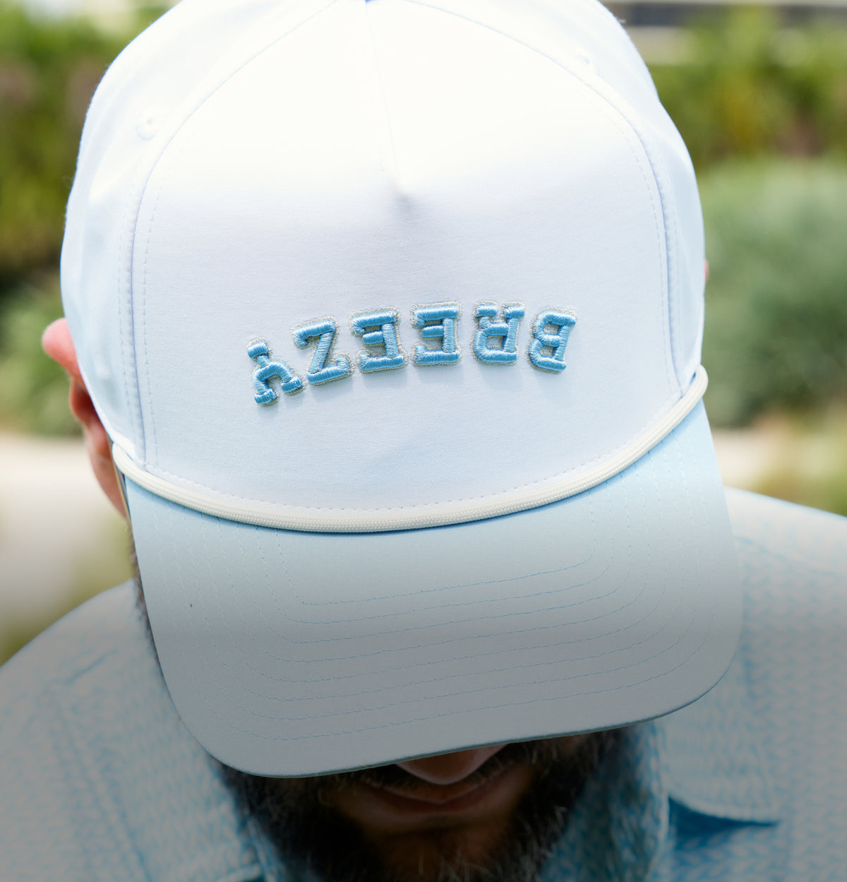 Breezy golf hat with upside down letters